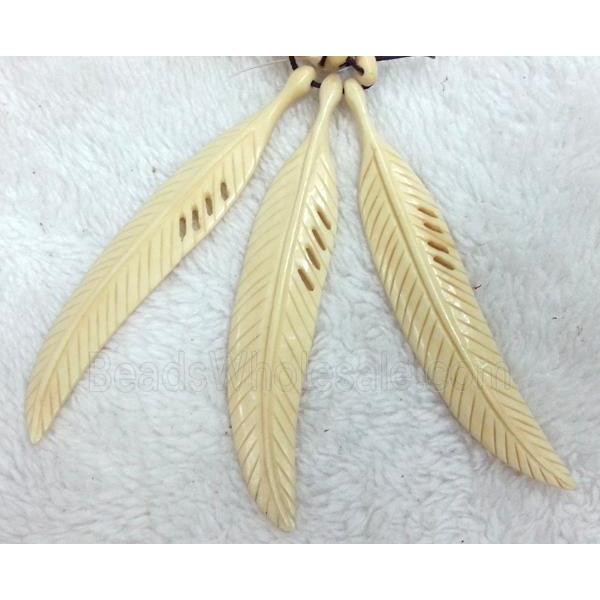 yellow cattle bone pendant, feather