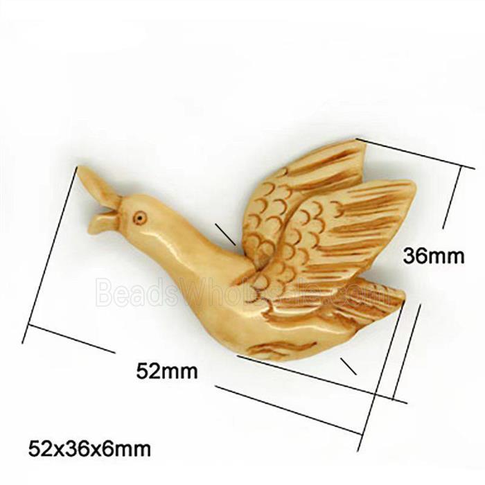 antique cattle bone beads, swan, yellow