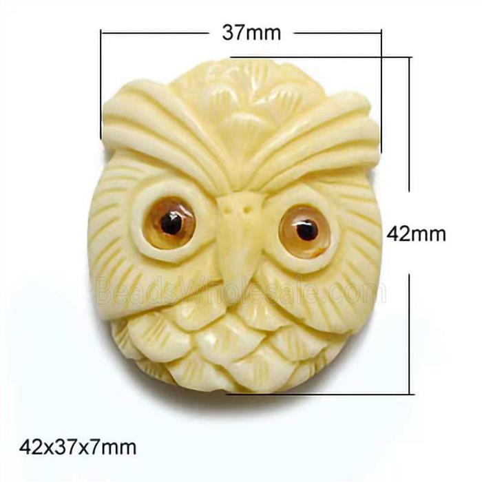 antique cattle bone beads, yellow, owl