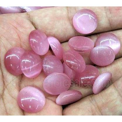 cat eye cabochon, round, flat black, pink