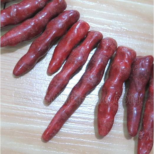 red coral beads, stick, freeform