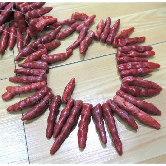 red coral beads, stick, freeform