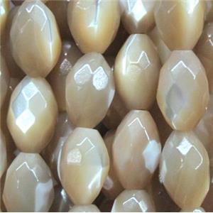 mother of pearl bead, faceted oval, approx 7x10mm [SHEMP64]