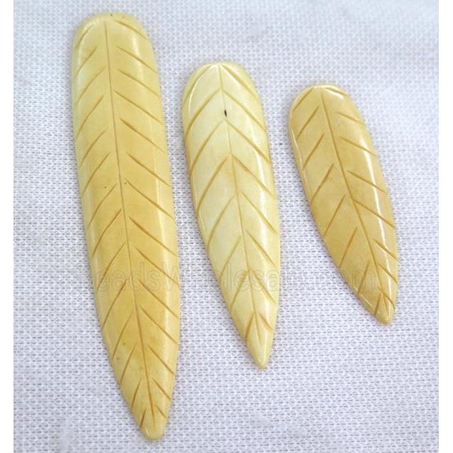 yellow cattle bone pendant without hole, leaf