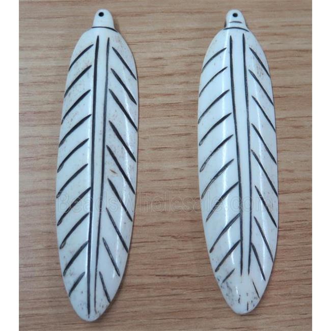 white cattle bone leaf pendant
