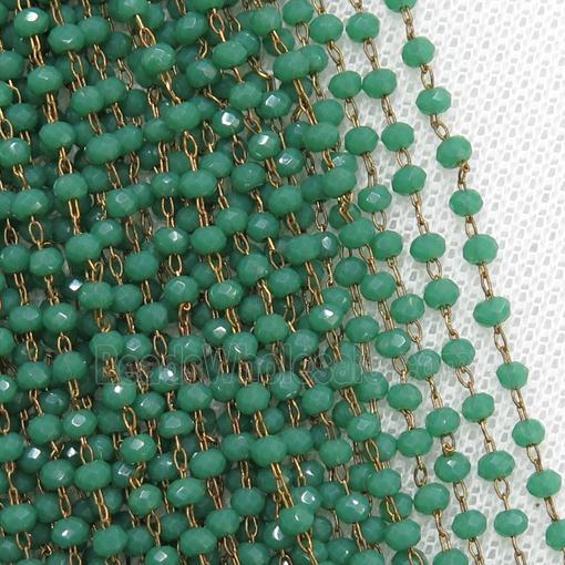 raw brass chain with green crystal glass