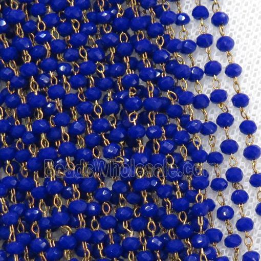 raw brass chain with blue crystal glass