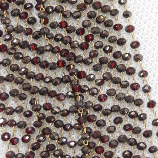 raw brass chain with darkred crystal glass