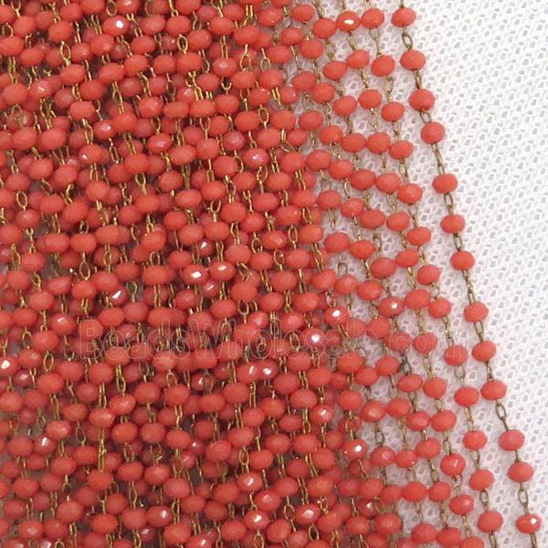 raw brass chain with red crystal glass