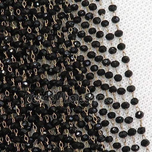 raw brass chain with black crystal glass