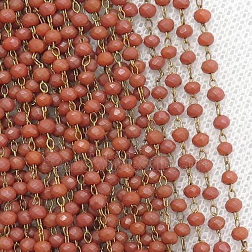 raw brass chain with matte red crystal glass