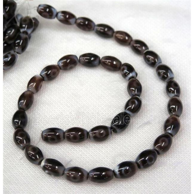 black Tibetan Agate barrel beads with evil eye