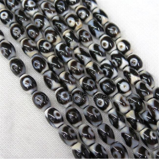 black Tibetan Agate barrel beads with evil eye