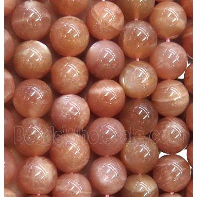 Sunstone beads, round, AAA-grade
