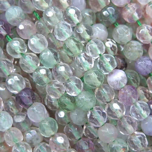 tiny green Fluorite bead, faceted round