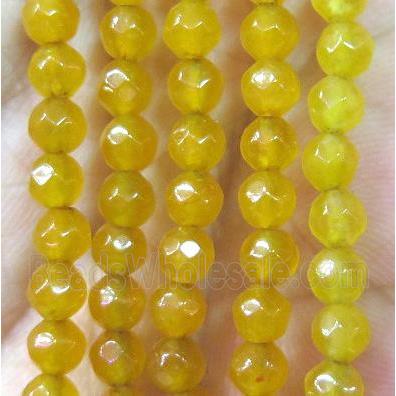 Tiny golden agate bead, faceted round