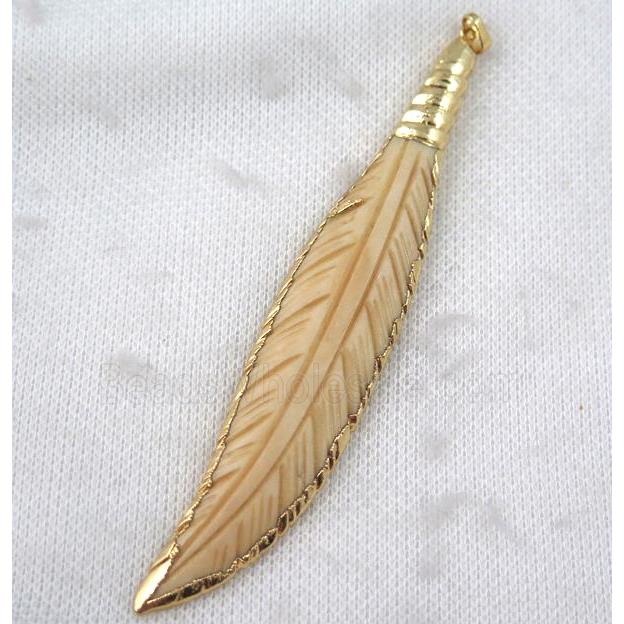 yellow cattle bone feather pendant, gold plated