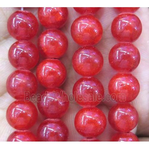 red jade bead, round, stabile