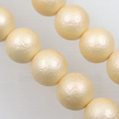 round matte yellow pearlized shell beads