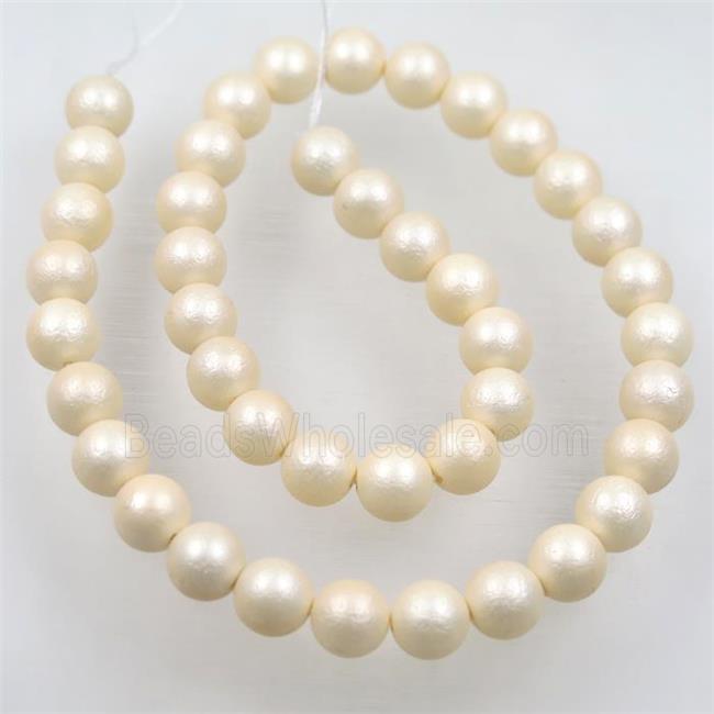 round matte lt.yellow pearlized shell beads