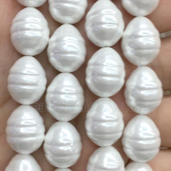 white pearlized shell beads, teardrop