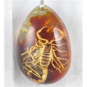 Amber teardrop pendant with scorpion, orange, NR, approx 40-60mm [GMPDA6558]