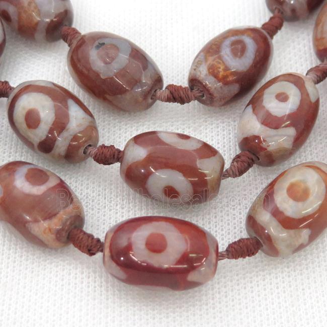 red Tibetan Agate barrel beads, eye