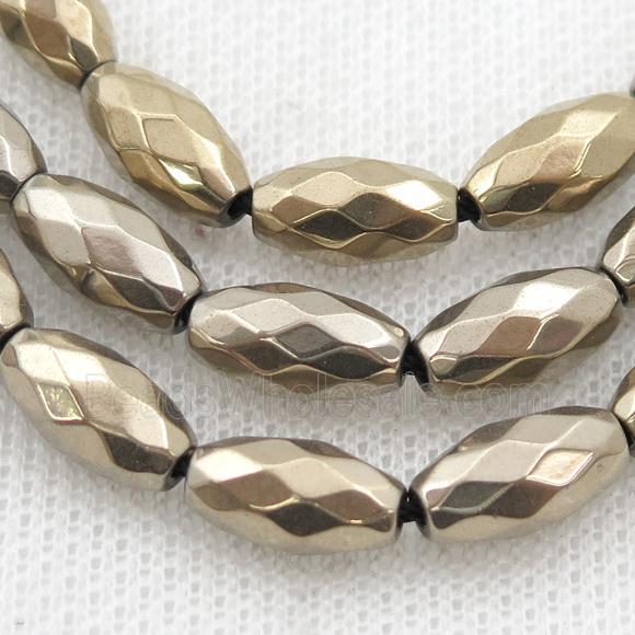 Hematite beads, faceted rice, pyrite color electroplated
